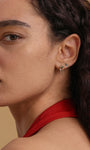 KOSINER elegant silver jewelry featuring intricate design and shimmering accents, perfect for adding a touch of sophistication to any outfit.