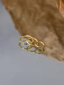 Three 18K gold plated sterling silver hoop earrings in small, medium, and large sizes showcased on a reflective surface.