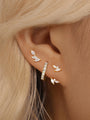 Fashion Horse Eye Zircon Earring Series: 18k gold-plated earrings with marquise-cut cubic zirconia, shown on an ear.