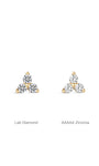 14K solid gold trinity stud piercings comparing lab diamond vs AAAAA cubic zirconia gemstone options.