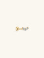 14K solid gold curved ear piercing stud with three pave stones and flat back post.