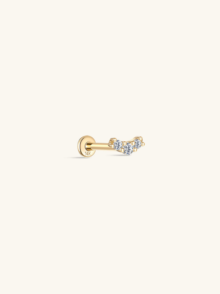 14K solid gold curved ear piercing stud with three pave stones and flat back post.