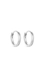 Pair of polished sterling silver huggie hoop earrings on white background, classic daily wear.