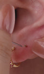 Layered full ear stack look with KOSINER Gem Garden purple gem collection, gradient amethyst daith clicker hoop matched with crown, marquise, pink tourmaline mini flat back studs