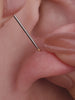 Layered ear stacking styling with KOSINER rainbow light piercing jewelry collection, triangular flower flat back studs matched with hoops for multi-position helix lobe tragus