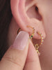 Layered full ear stack with KOSINER Orchard fruit studs and rainbow ear climber, pineapple, banana, purple cherry flat cartilage piercings match rainbow curved crawler earring
