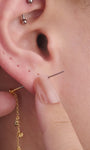Model wearing KOSINER oceanic crab flatback stud in a curated ear stack