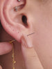 Model wearing KOSINER oceanic crab flatback stud in a curated ear stack