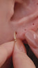 Edgy personalized full ear stacking look featuring KOSINER Prism spliced marquise flat back stud, matched spike dangle studs, chain conch piercing jewelry, pave cz helix piercings, modern sharp-line multi-position ear styling