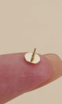 KOSINER 14K gold minimalist disc stud close-up, smooth polished finish