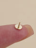 KOSINER 14K gold minimalist disc stud close-up, smooth polished finish