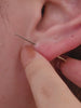 KOSINER Elegant three-stone flat back stud, forming a delicate triangular shape, perfect for subtle ear styling